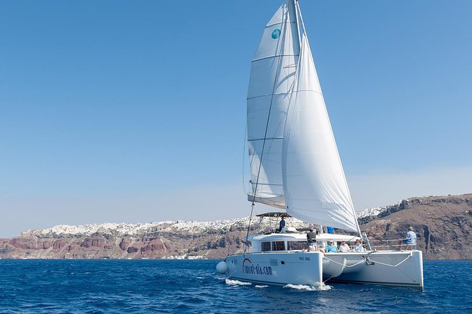 Santorini Small-Group Catamaran Sailing Trip(BBQ,drinks, transfer) - White Beach is the main swim and meal stop