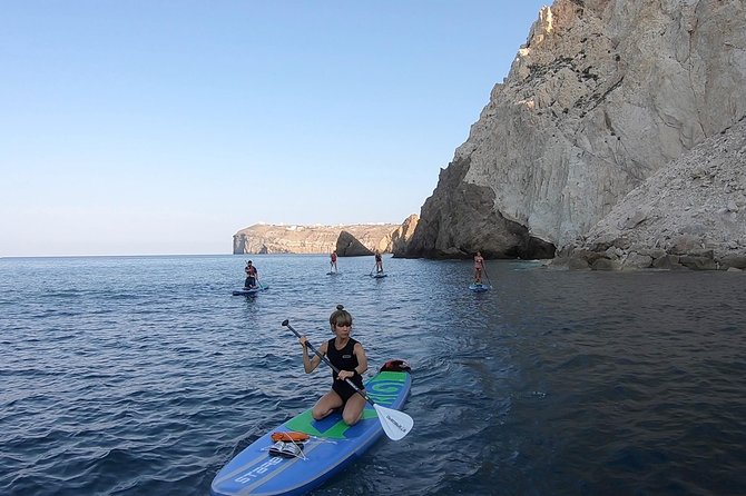 Santorini Stand-Up Paddle and Snorkel Adventure - Paddling beside Santorini’s cliffs