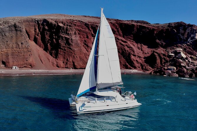 Santorini: Standard Small-Group Catamaran Cruise with Food/Drinks - Leaving Vlychada and reaching the volcanic coast