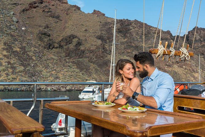 Santorini Sunset Dinner Cruise Including Nea Kameni Visit - Dinner near Thirasia as the light fades