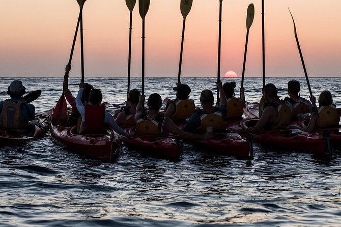 Santorini: Sunset Sea Kayak with Light Dinner with Pick-up Option - Red Beach and the volcanic coast