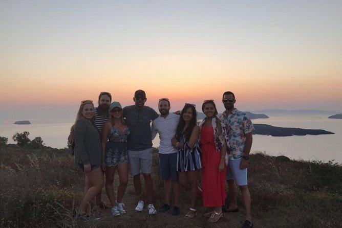 Santorini Sunset Wine Tour with Santo Winery Views - Pickup, group size, and timing