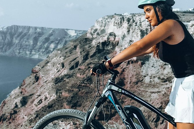 Santorini Tour on Electric Bikes & Scooters - Pickup, timing, and group size