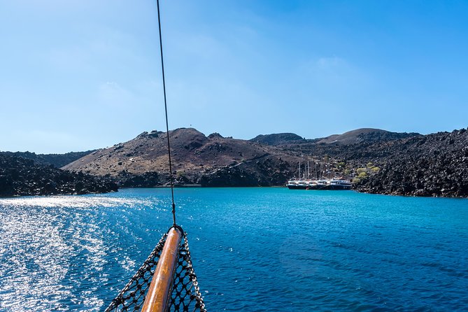 Santorini Volcano and Hot Springs Cruise Tour from Fira Old Port - What to pack for the volcano and springs