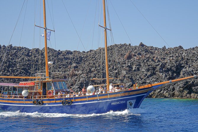 Santorini Volcano Cruise Including Hot Springs and Thirasia - Santorini’s caldera from the water