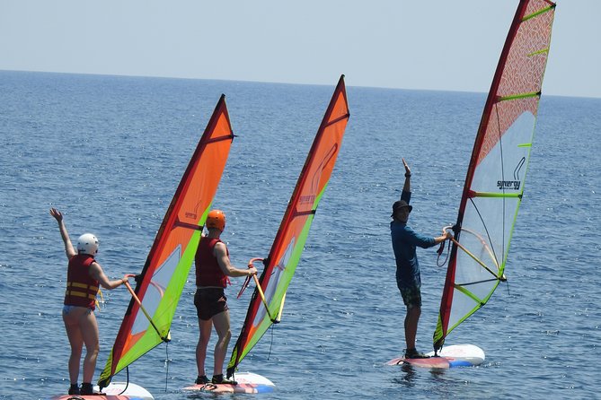 Santorini Windsurfing lessons - Learning windsurfing on Santorini’s water