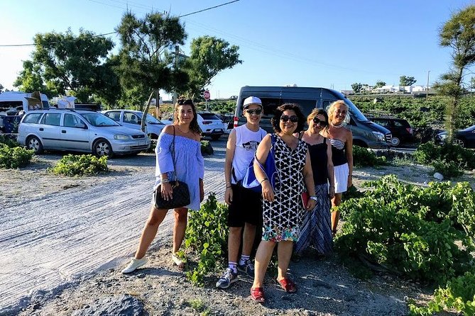 Santorini Wine and Food Experience with pick up included - Perivolos Beach and the black-sand setting
