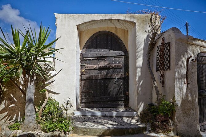 Santorini wine tasting and Traditional Cave Settlement Tour - Small-group touring with room to ask questions