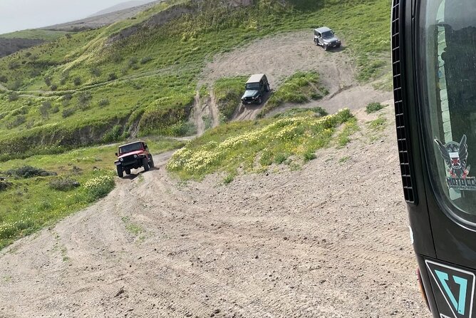 Santorini Wrangler Jeep Afternoon Convoy Tour - Eros Beach, swimming, and the dusty tracks