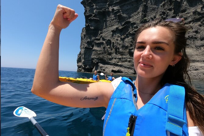 Small-Group Santorini Sea Caves Kayak Trip with Snorkeling & Picnic - Black Mountain and the changing volcanic colors