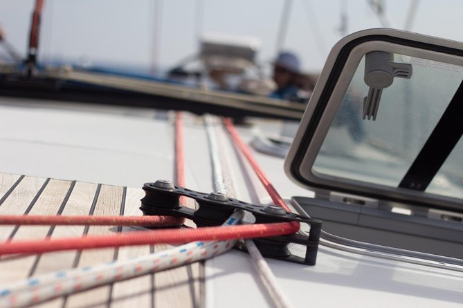 Sunset Caldera Sailing Cruise - Akrotiri Lighthouse and the southern coast