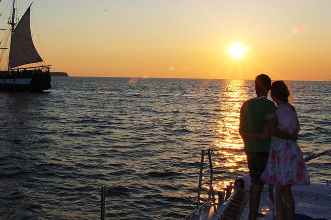 Sunset Sailing Catamaran Cruise in Santorini with BBQ and Drinks - From Ammoudi or Athinios Port toward the volcano