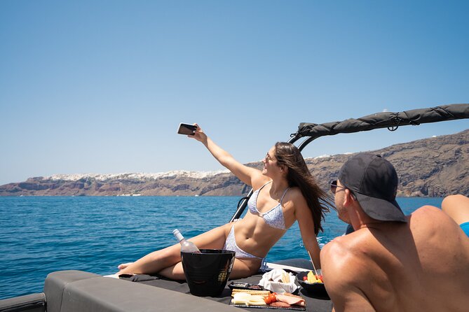 Unique Half-Day Private Motor Boat Cruise in Santorini - Sunset below Oia