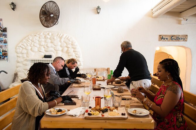Wine tasting and Carving lesson in Santorini - Who will enjoy this Akrotiri activity most